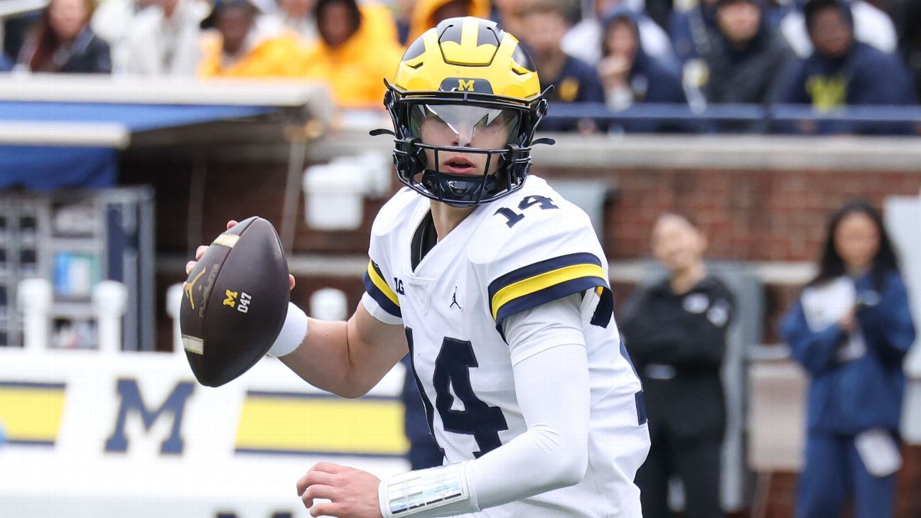 Michigan tabs Carr, ex-coach's grandson, as QB2