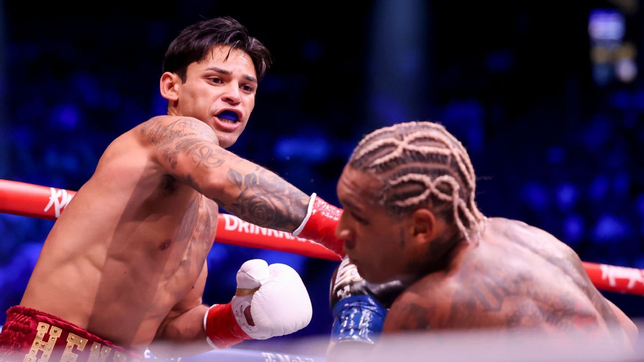 Garcia backs up talk, TKO's Benn in second round to retain WBC title